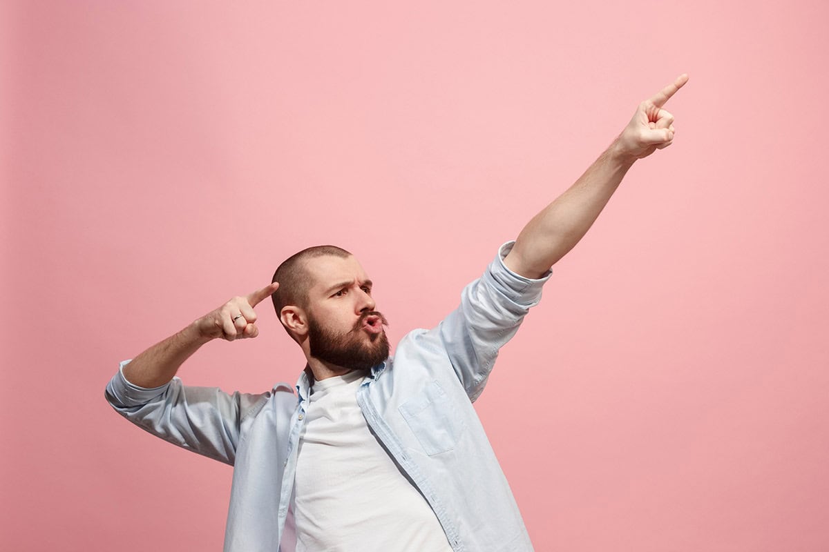 man celebrates interest rate drop